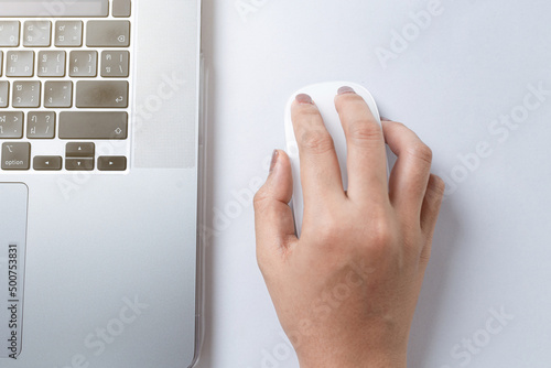 close up of a hand holding a control photo