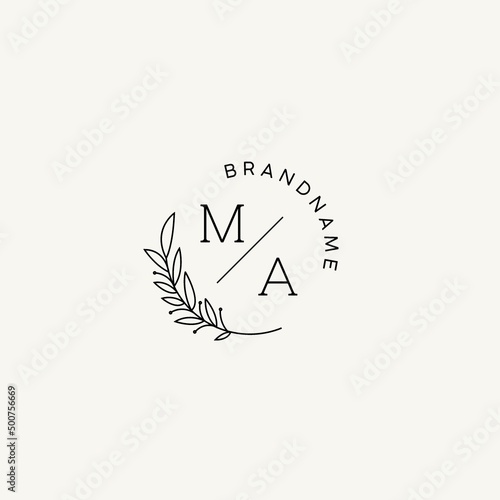 Monogram MA with leaves and circular line, elegant luxury logo idea