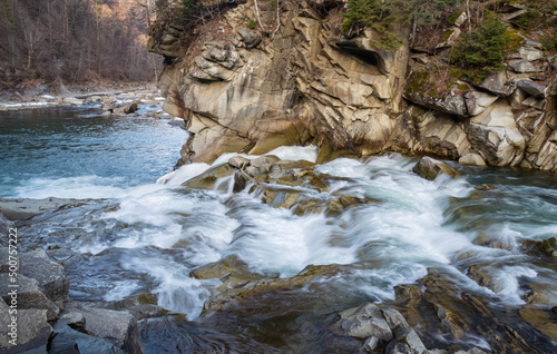 waterfall and river rapids in the Carpathian mountains in Yaremche Ukraine photo