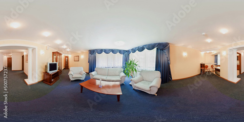 seamless 360 panorama in interior of living room of cheap hotel,  flat or apartments with sofa chairs and tv in equirectangular projection with zenith and nadir. VR AR content