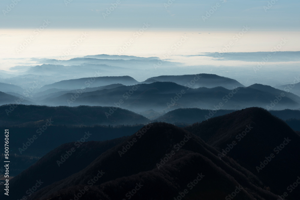 Foggy hills landscape in Italy