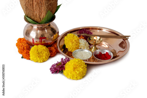 kalash pujan ganesha pujan Indian festival akshaya tritiya Decorative kalash with coconut and leaf with floral decoration photo