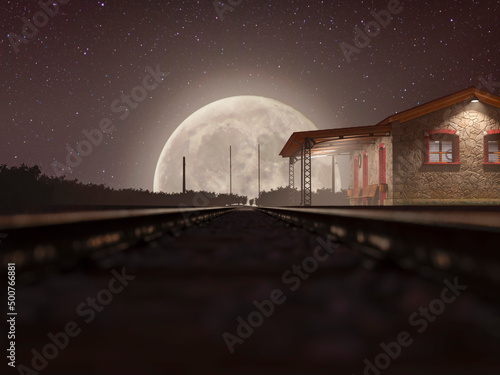 The railway track on a misty night with a full moon