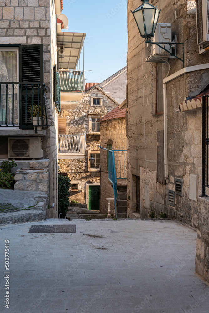 Narrow street in the old town of Omis, Croatia