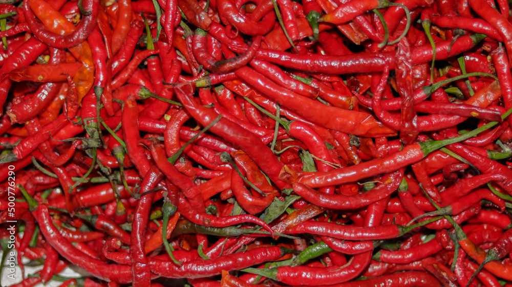 Red chili peppers close up - red chili in the supermarket Red chili peppers close up - red chili in the supermarket