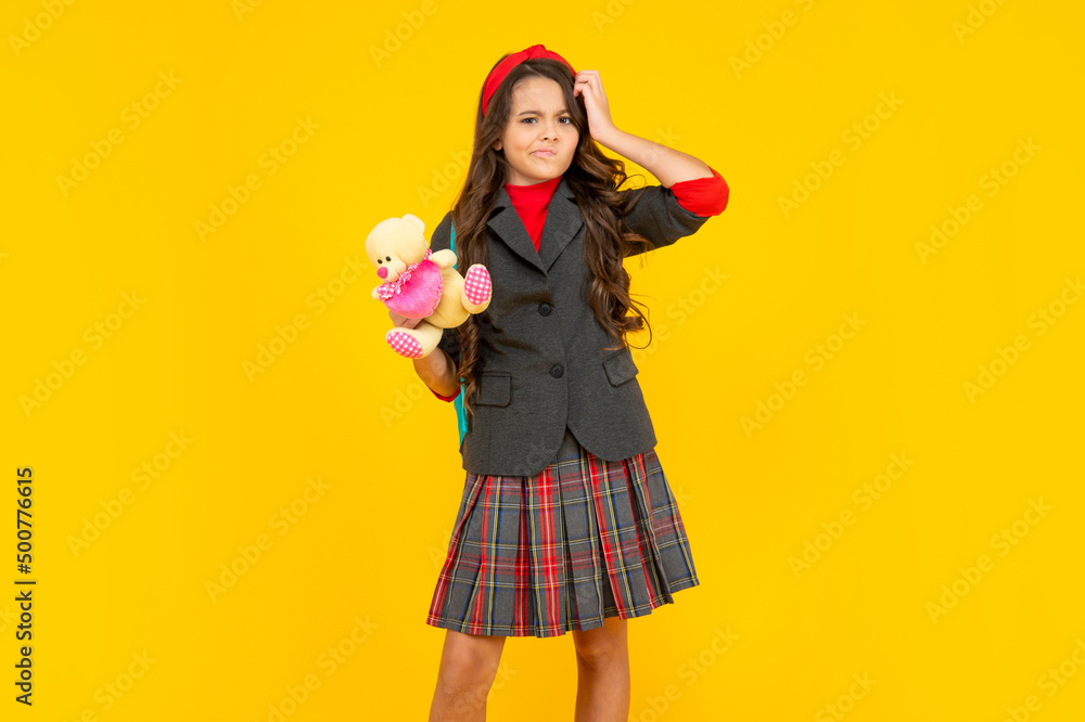 concept of education. kid in uniform on yellow background. september 1. concept of education. kid in uniform on yellow background. september 1.
