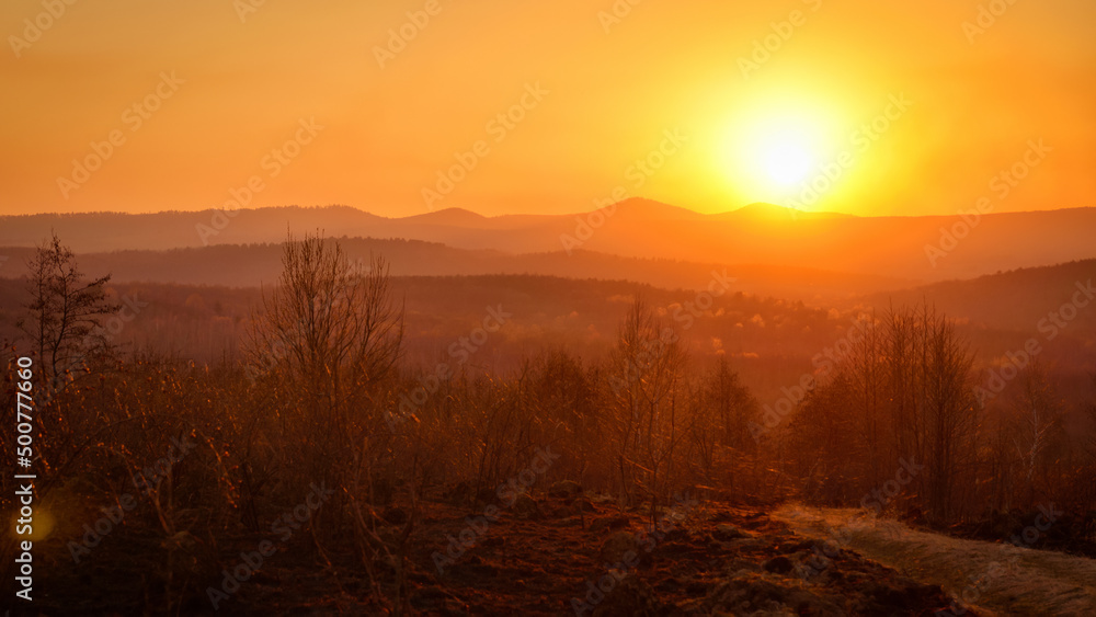 Bright sunset or dawn in a mountainous area