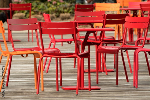 Red and orange chairs at street cafe  in Redmond