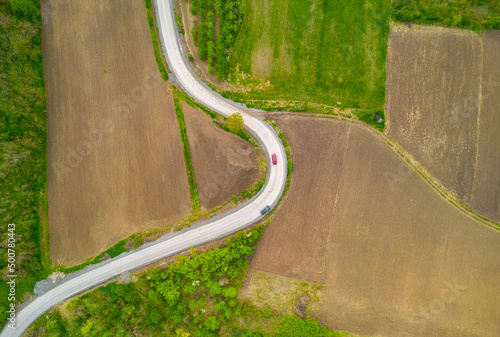 Aerial photo of road in forest