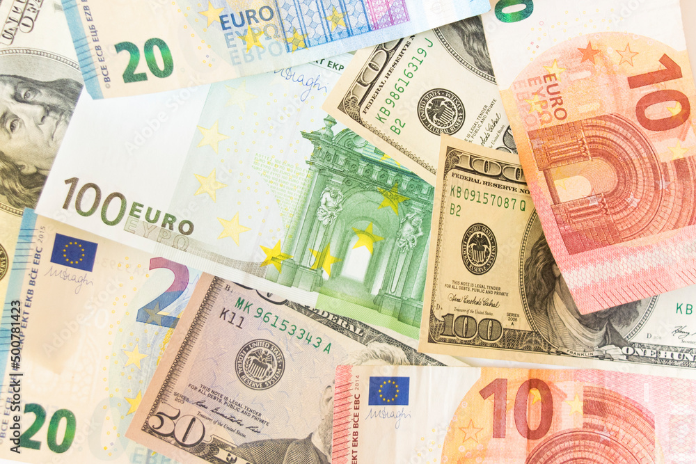 Background made of dollar and euro banknotes Background made of dollar and euro banknotes