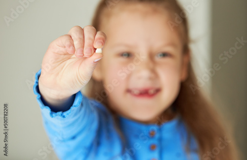 Toothless child. Cute little girl smiles broadly. The first milk tooth fell out. The concept of pediatric dentistry and dental hygiene