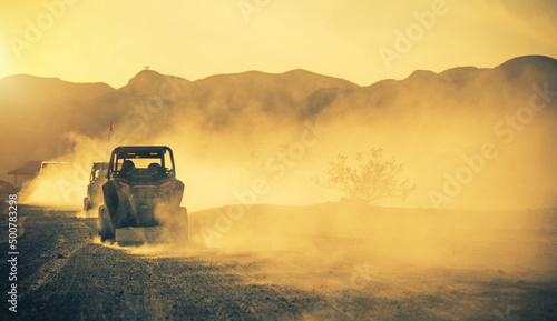 Side by Side ROV Recreational Off Highway Vehicles on a Desert Road