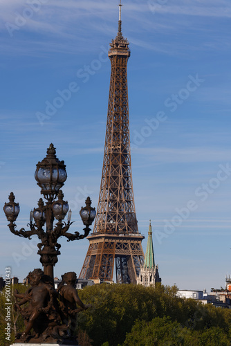 Eiffel tower viewed from famous Alexandre III bridge in Paris
