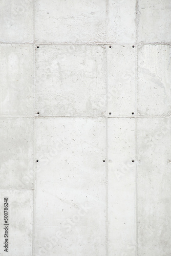Concrete background with rough formwork marks. Abstract patterned concrete wall backdrop.