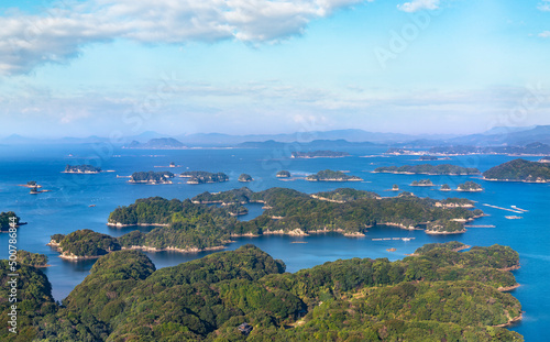 Beautiful bird's-eye view of a seascape of the Kujūkushima islands that lie off sasebo famous for its saw-toothed coast with multiple islets part of Saikai National Park in Kyushu. photo
