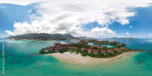 Seamless spherical 360 degree HDRI aerial panorama of Eden Island, Victoria, Seychelles. View of a luxury tourist hotel with beaches and a harbor for yachts, catamarans and boats