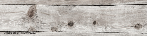 Jasne naturalne drewniane tło Tekstura białego skorodowanego drewna. Panorama.  © Janusz