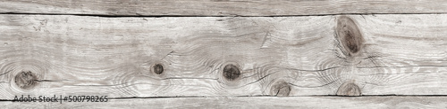 Brązowe naturalne drewniane tło Tekstura jasnego w kolorze szarości i brązu skorodowanego drewna. 