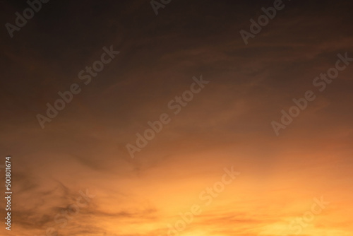 Colorful clouds in the sky at sunrise or sunset. Natural natural background. © Gustavo