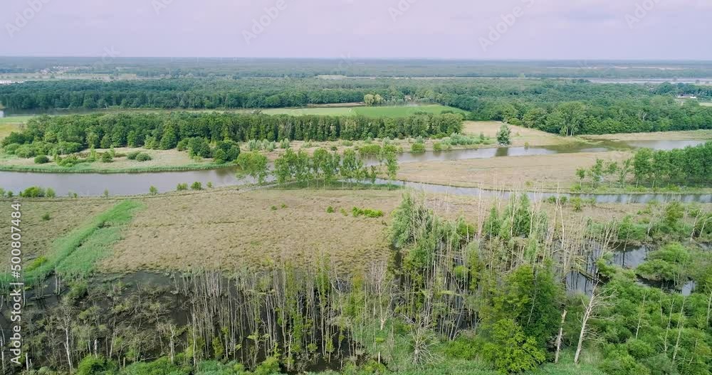 Aerial view of flooded farmland during high water, Swolgen, Maas, Netherlands. Aerial view of flooded farmland during high water, Swolgen, Maas, Netherlands.