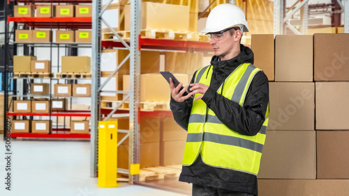 Man with a tablet in a ware...