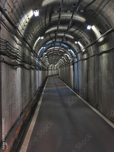 Fototapeta Naklejka Na Ścianę i Meble -  Toyama,Japan - April 23, 2022: Interior of Tateyama Tunnel, a part of Tateyama Kurobe Alpine Route Japan
