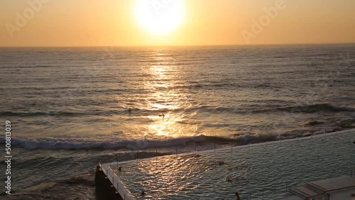 Swimming at sunrise, Bondi - New South Wales, Australia