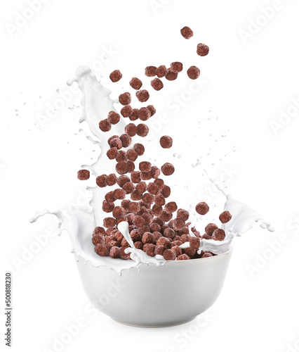 Bowl with chocolate corn balls on white background photo