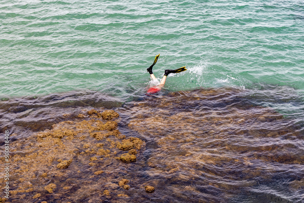 A male snorkelling around the reefs at Port Noarlunga South Australia on February 28th 2022