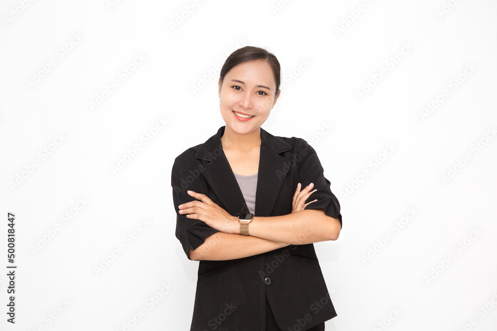 Beautiful Asian business woman wearing black suit with her crossed arms on white background and copy space. Confident Asian working woman smiling and cheerful Beautiful Asian business woman wearing black suit with her crossed arms on white background and copy space. Confident Asian working woman smiling and cheerful