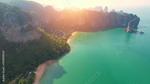 An aerial view of the coast, mountains and many beautiful islands amid turquoise waters. Tropical seas in Thailand. Aonang, Krabi, Thailand. 4K drone
 photo