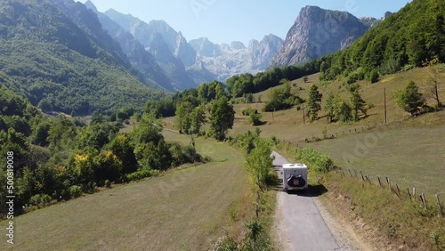 Motorhome (Camper Van) Driving in Prokletije National Park, Montenegro - Drone Aerial Dolly photo