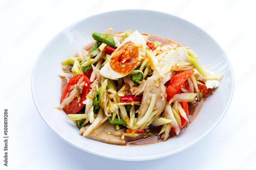 Spicy papaya salad with salted egg and vietnamese pork sausage Spicy papaya salad with salted egg and vietnamese pork sausage