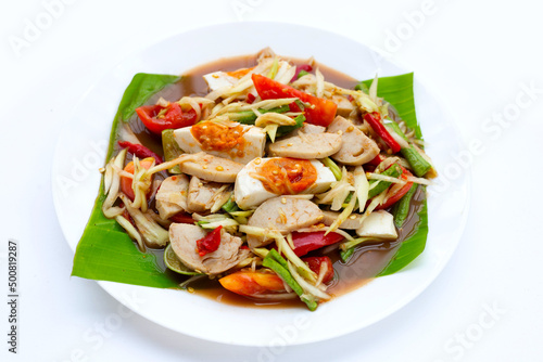 Spicy papaya salad with salted egg and vietnamese pork sausage