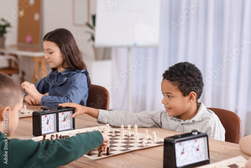 Little children playing che...