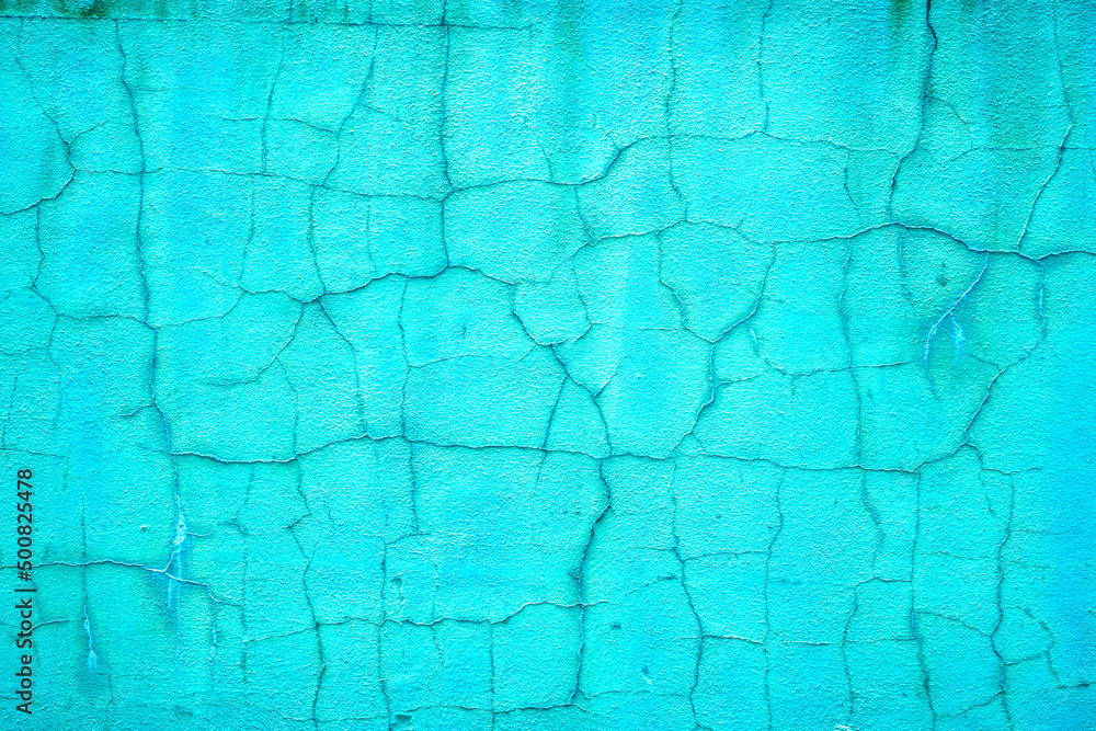 Obraz premium Rough vintage cracked bright green stucco background