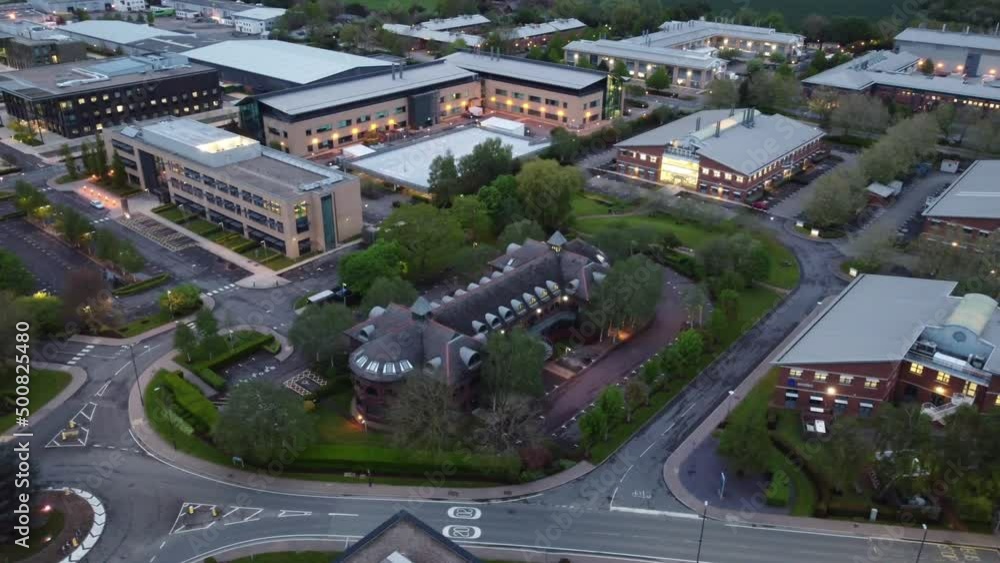 Transverse flight (slow) over a deserted business park in the UK at dusk. Transverse flight (slow) over a deserted business park in the UK at dusk.