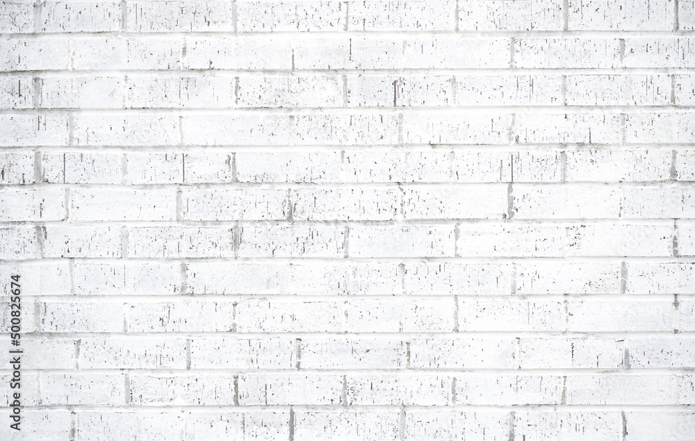 Fototapeta premium Grunge white painted bricks
