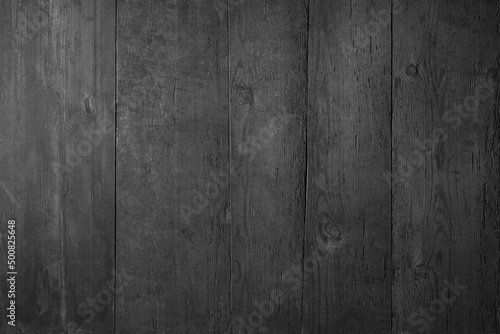 dark wood texture, top view. black wall boards as background
