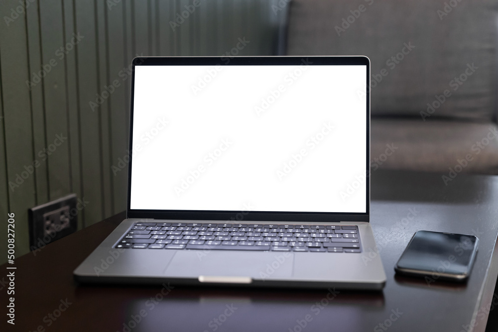 Computer laptop with blank screen on table of coffee shop, mockup notebook laptop empty screen for editing graphics for ads.. Computer laptop with blank screen on table of coffee shop, mockup notebook laptop empty screen for editing graphics for ads..