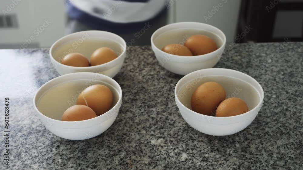 closeup of several boiled eggs in plastic containers to have breakfast among friends in the day in 4k closeup of several boiled eggs in plastic containers to have breakfast among friends in the day in 4k