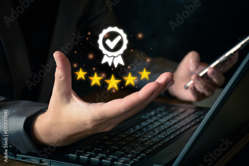 The concept of providing a five-star premium service. businessman showing award High standards are guaranteed, service quality, business success, work efficiency, top quality assurance 5 stars.