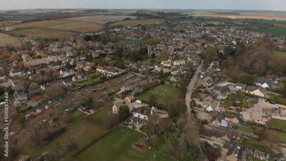 Aerial view of Stonesfield, a pretty West Oxfordshire village. Sunshine Aerial view of Stonesfield, a pretty West Oxfordshire village. Sunshine