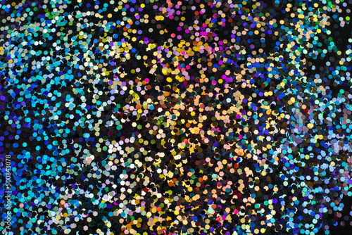 Colorful hexagon confetti on black