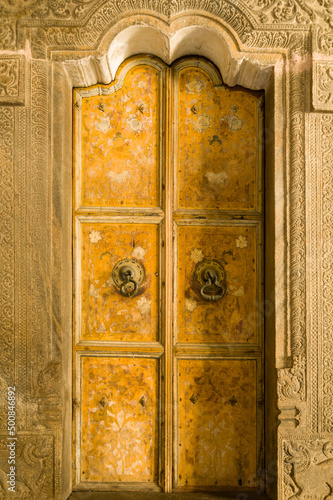 Old wooden door of the tooth relic shrine room, Sri Dalada Maligawa, Kandy, Sri Lanka photo