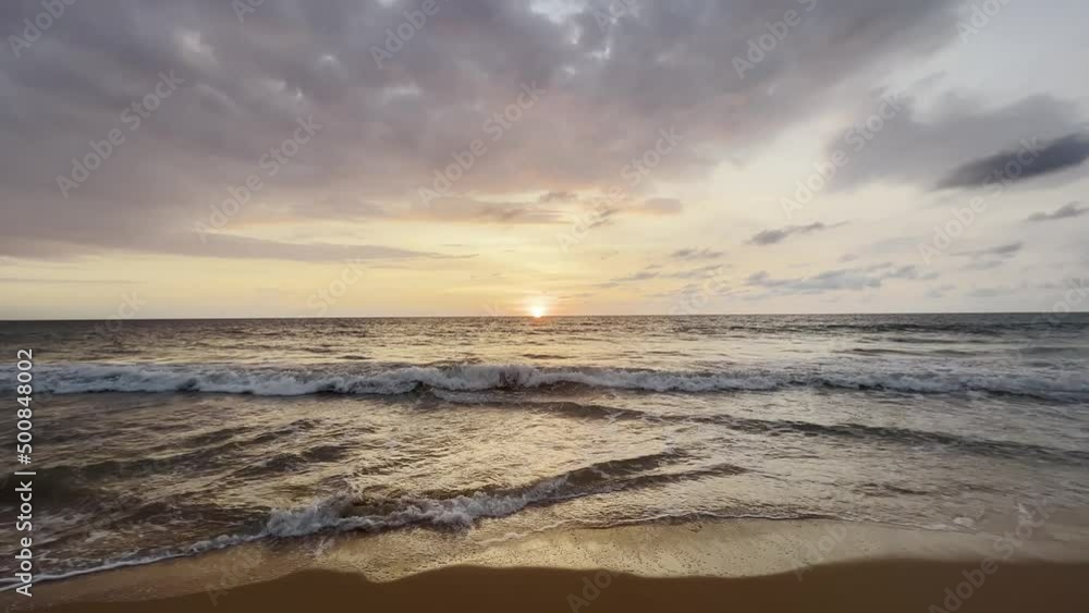 Dramatic sea sunrise. Nature amazing orange sunset. Sun and ocean with big waves. 60 fps Dramatic sea sunrise. Nature amazing orange sunset. Sun and ocean with big waves. 60 fps