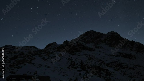 Golden Ears Peak as seen from camp just below the summit on October 31, 2021. Timelapse captures about 5 hours of star movement during one of the windiest recorded nights of the season. photo