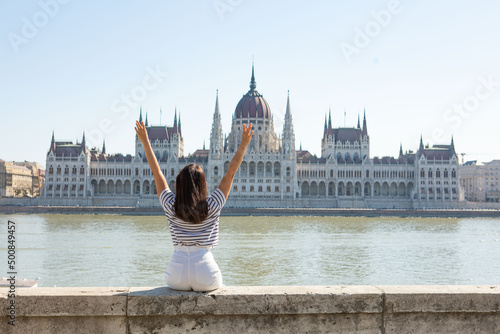 Photography smiling woman portrait in front of Budapest parliament building