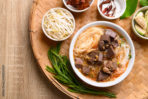 Northern Thai food, Spicy rice noodles soup with pork eating with fresh vegetables, Local Thai food