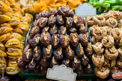 Close up of display with traditional turkish delights, dried fruits and nuts at Egyptian Bazaar. Best delicious turkish foods to try on trip to Istanbul. Selective focus